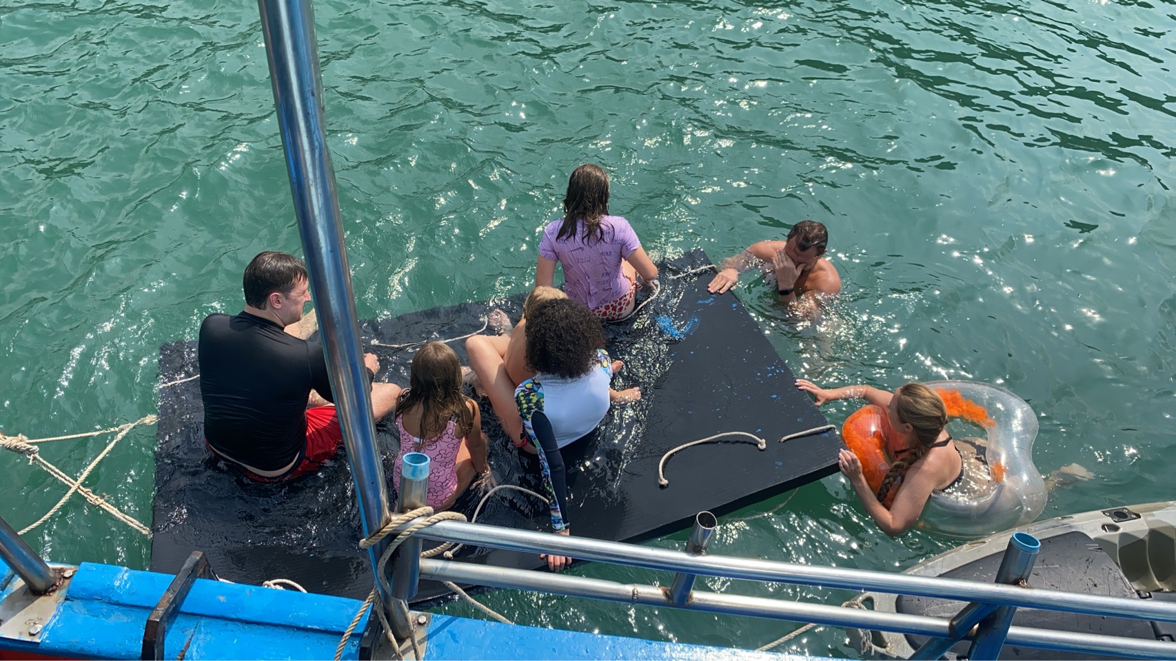 Swim, snorkel, paddle, or stay on the boat.